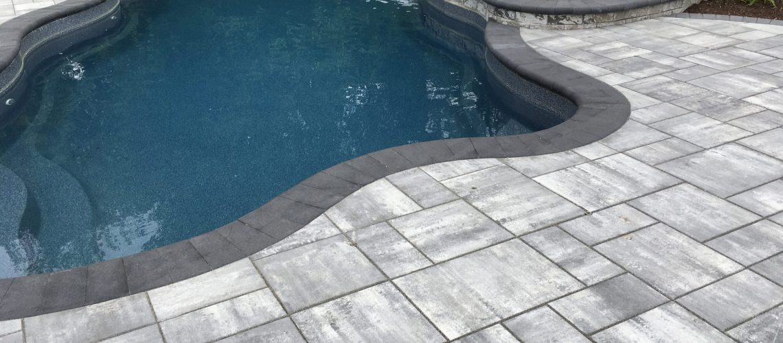 does fiberglass pool last as long as gunite RI